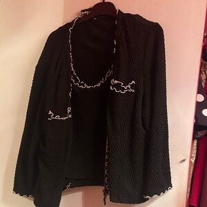 Elegant Black Jacket with White Trim